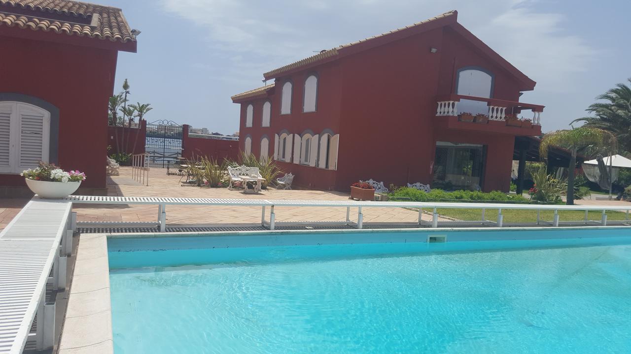I Giardini Di Giano Torre Faro Bagian luar foto